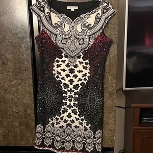 Mixed patterns, mid thigh length, circle neckline